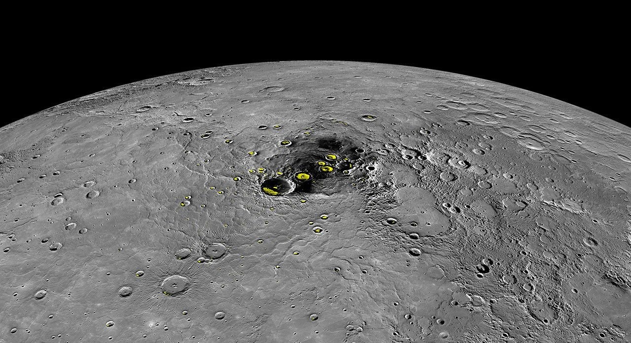 North polar Mercury mosaic with yellow overlays marking locations with radar evidence for water ice