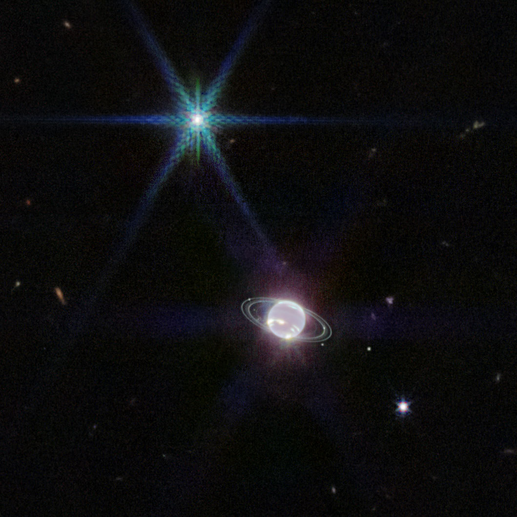 Webb near-infrared view of Neptune’s faint rings and a bright Triton with diffraction spikes